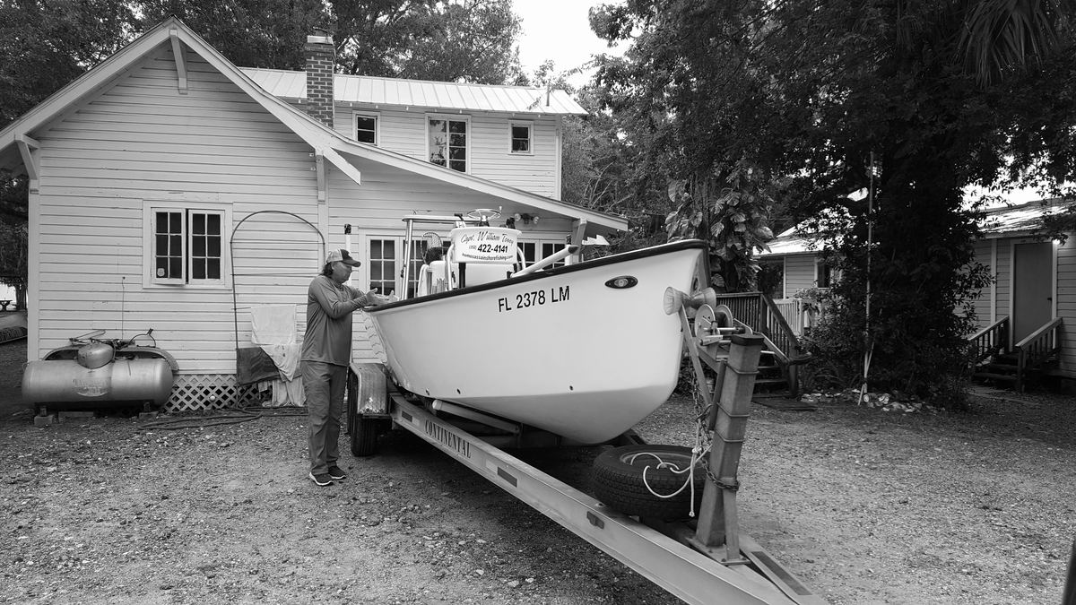 Captain William Toney loading his custom 23-foot Tremblay flats boat