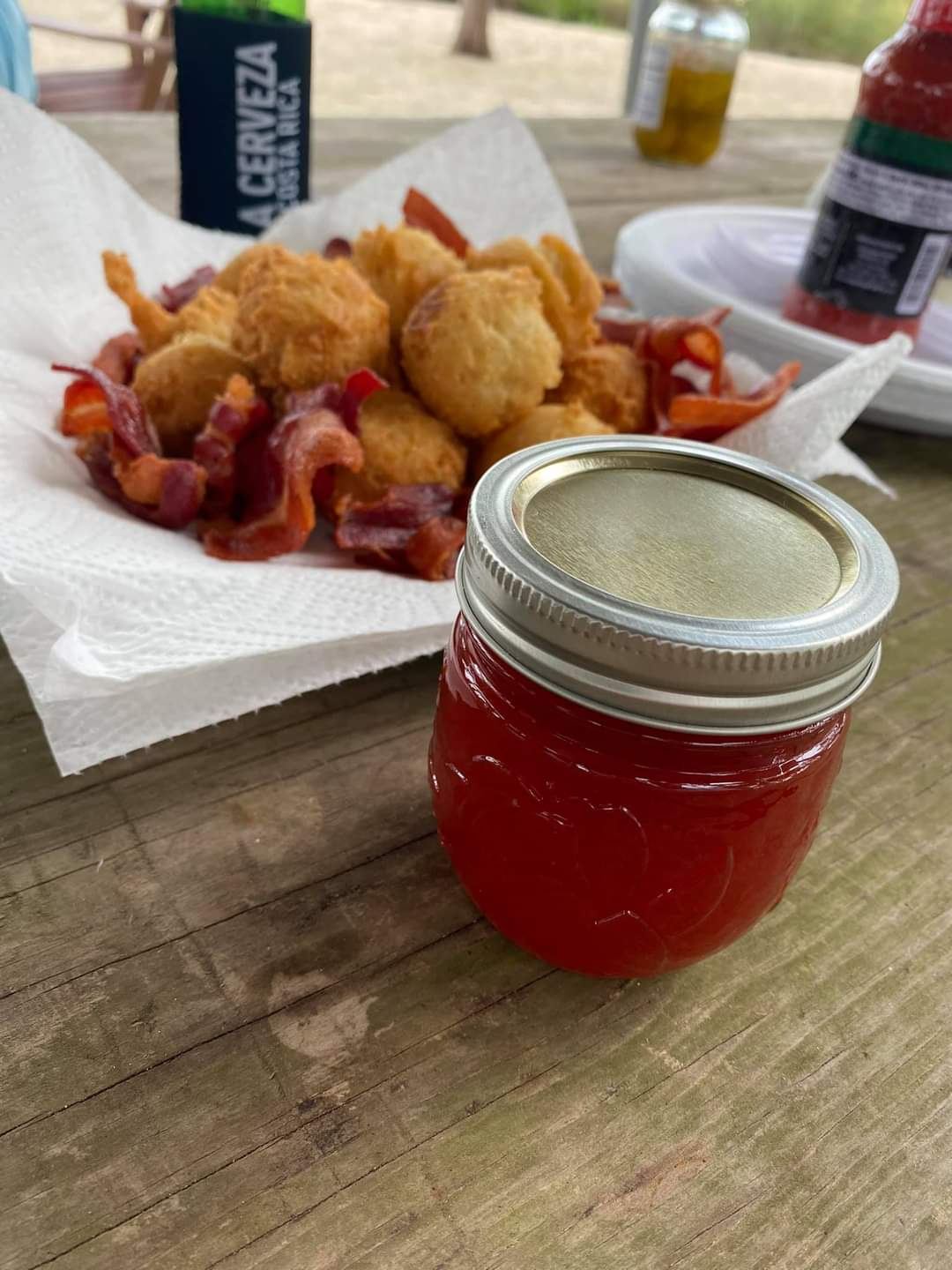 Traditional Homosassa shore lunch cooked on a secluded island — hush puppies and fresh catch